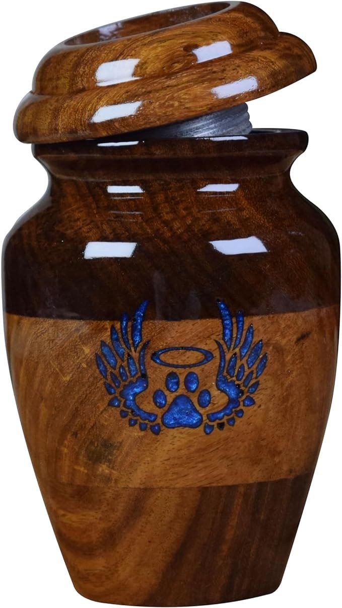 Polished wooden pet memorial urn with a decorative motif